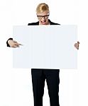 Female Pointing At White Billboard Stock Photo