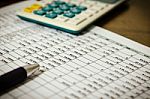 Financial Data Table And Calculator Stock Photo