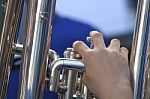 Fingers Of A Musician Playing The Trumpet Stock Photo