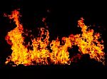 Fire Burning In Black Background Stock Photo