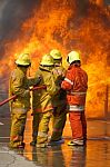 Fireman. Firefighters Fighting Fire During Training Stock Photo