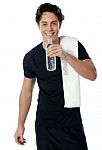 Fit Man Drinking Water Isolated On White Stock Photo