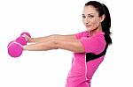 Fitness Trainer Lifting Dumbbells Stock Photo