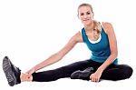 Fitness Woman Doing Stretching Exercise Stock Photo