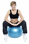 Fitness Woman Relaxing On Exercise Ball Stock Photo