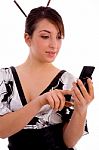 Front View Of Smiling Woman Using Cell Phone Stock Photo