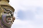 Giants Statue On Sky Background At Wat Phra Kaew In Bangkok, Thailand Stock Photo