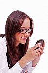 Girl Sending Text Sms At Cell Phone Stock Photo