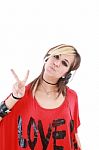 Girl With Headphones And Gesture Stock Photo