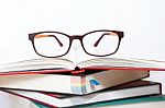 Glasses On Stack Of Books Stock Photo