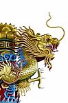 Golden Dragon Statue On White Background Stock Photo