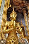 Golden Statue Of Kinara Sawasdee At Wat Phra Kaew In Grand Place Complex In Bangkok, Thailand Stock Photo