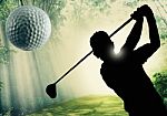 Golfer Putting A Ball On The Green Stock Photo