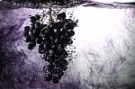 Grape In Water Stock Photo