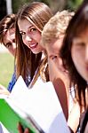 Group Of Students Reading Books Stock Photo