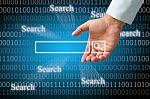 Hand Clicking Internet Search Page Stock Photo