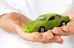 Hand Holding Eco Car Icon Stock Photo