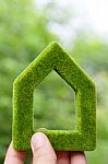 Hand Holding Green House Icon Stock Photo