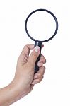 Hand Holding Magnifying Glass Stock Photo