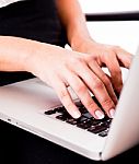Hands Typing On Laptop Stock Photo