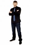 Handsome Young Male Executive With Folded Arms Stock Photo