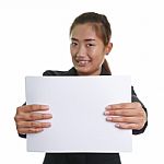 Happy Businesswoman Holding A White Banner Stock Photo