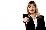 Happy Businesswoman Pointing At Camera Stock Photo