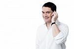 Happy Man Talking On His Mobile Phone Stock Photo
