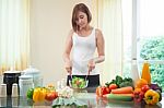 Happy Woman Cooking Vegetables Green Salad Stock Photo