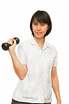 Healthy Woman Lifting A Dumbbell Stock Photo