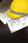 Helmet Of Constructor With Blueprints Stock Photo