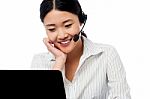 Help Desk Operator Communicating With Client Stock Photo