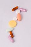Isolated Multi Color Of Pills Stock Photo
