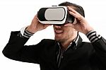 Isolated Young Businessman With Virtual Reality Glasses Stock Photo