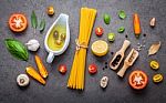 Italian Food And Menu Concept Spaghetti With Ingredients On Dark Stock Photo