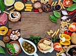 Italian Food Cooking Ingredients On Dark Stone Background With C Stock Photo