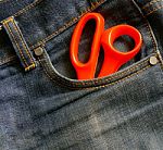 Jeans With Scissors Stock Photo