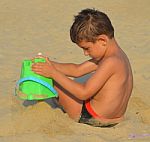 Kid On The Beach Stock Photo