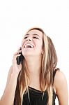 Lady Bursting Out Laughing On Phone Stock Photo