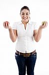 Lady Holding Apples In Both Hands Stock Photo