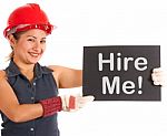 Lady Showing Hire Me Board Stock Photo