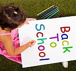 Little Girl Writing Back To School Stock Photo