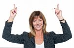 Lovely Corporate Woman With Raised Arms Stock Photo