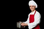 Male Chef Holding Empty Vessels Stock Photo