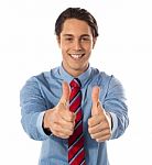 Man Showing Thumb Up Gesture Stock Photo