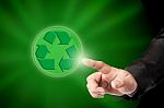 Man Touching Recycle Sign Stock Photo
