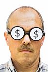 Man With Dollar Signs On His Glasses Stock Photo