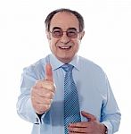Mature Businessman With Thumbs Up Stock Photo