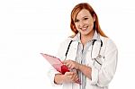 Medical Expert Holding Clipboard Stock Photo