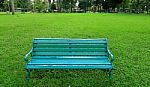 Metal Garden Chair On Green Grass Stock Photo